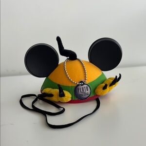 colorful mouse ear hat with pluto badge